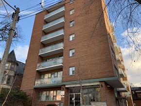 Toronto apartment for rent - an apartment building with a red brick facade and balconies at 161 St. George, Toronto, CA M5R 2M3
