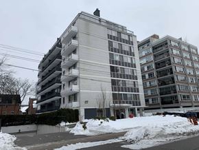 Toronto apartment for rent - a building in a city with snow on the street at 177 Saint George in Toronto, CA