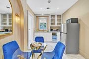 North Haven apartment for rent - A modern kitchen with a dining table  at Ardenwood Apartments, North Haven, CT