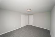 West Hartford apartment for rent - a bedroom with white walls and carpet and white doors  at Enclave West Hartford / Parc West, West Hartford
