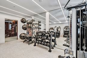 Meriden apartment for rent - a gym with weights and cardio equipment in a home at The Meriden, Meriden, 06450