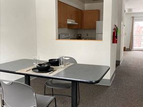 Burlington apartment for rent - a kitchen and dining room with a table and chairs