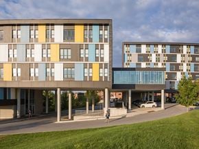 Burlington apartment for rent - a rendering of two buildings with a street in front of them