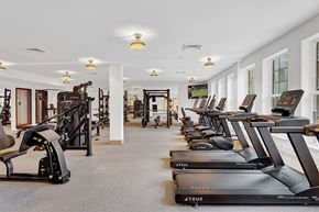 Roselle apartment for rent - A gym with treadmills and other exercise equipment.