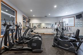 Portage apartment for rent - A gym with treadmills and exercise bikes.