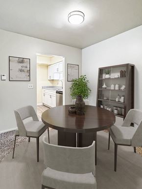 Kalamazoo apartment for rent - A dining room with a round table and chairs.