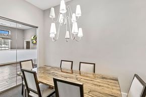 Westerville apartment for rent - A dining room with a wooden table and chairs.