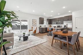 Inver Grove Heights apartment for rent - A modern kitchen with a dining table and chairs.