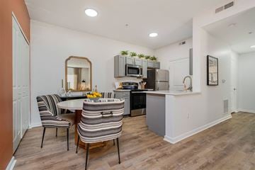 Westerville apartment for rent - a kitchen and dining room with a table and chairs