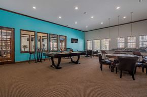 Plainfield apartment for rent - A conference room with a long table and chairs.