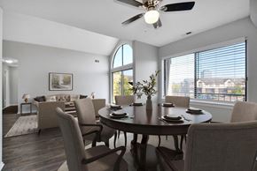 Southfield apartment for rent - A dining room with a table set for six.