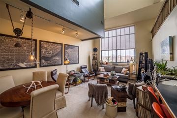 Southbend apartment for rent - A living room with a brown table and chairs.