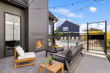 Outdoor lounge deck with fireplace