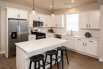 White shaker cabinets with matte black hardware