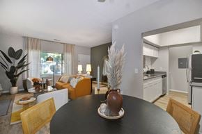 Holland apartment for rent - a dining room table with a vase on top of it