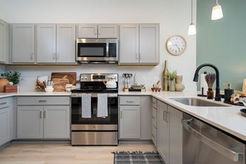 Stone gray kitchen cabinetry