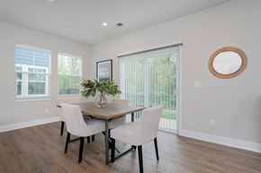 Lewis Center apartment for rent - a dining room with a table and chairs and a window