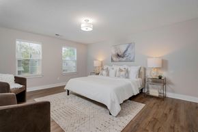 Lewis Center apartment for rent - a white bedroom with a bed and a couch