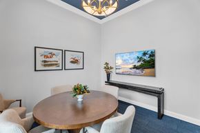 Perrysburg apartment for rent - A dining room with a wooden table and chairs.