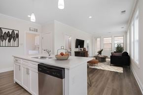 Columbus apartment for rent - A modern kitchen with a dishwasher and a bowl of fruit on the counter.