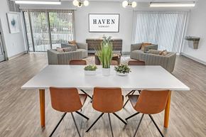 Hobart apartment for rent - a dining room with a white table and chairs