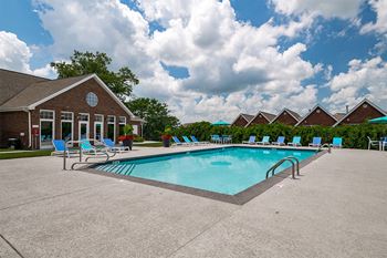 Outdoor swimming pool with tanning deck