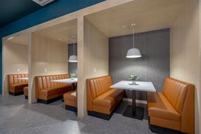 Pittsburgh apartment for rent - a dining room with orange chairs and a white table