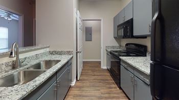 Light wood or gray cabinetry*