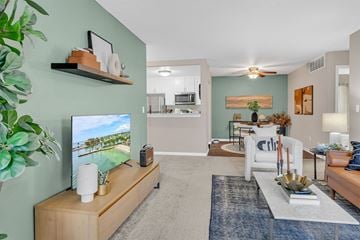 Southgate apartment for rent - A living room with a television and a couch.