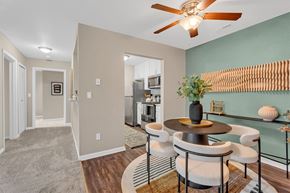 Southgate apartment for rent - A dining room with a table set for four.