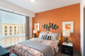 St. Louis Park apartment for rent - a bedroom with a bed and a large window