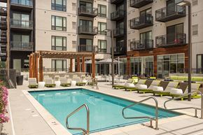 St. Louis Park apartment for rent - a swimming pool in the middle of an apartment building
