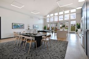 Ann Arbor apartment for rent - a dining room with a long black table and chairs