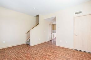 Columbus apartment for rent - A room with a staircase and a door.