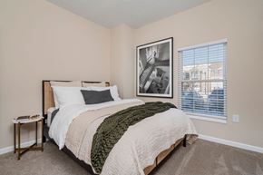 Lockbourne apartment for rent - A bedroom with a large bed and a picture on the wall.