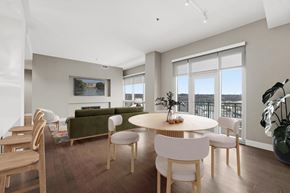 Cleveland apartment for rent - A modern dining room with a round table and chairs.