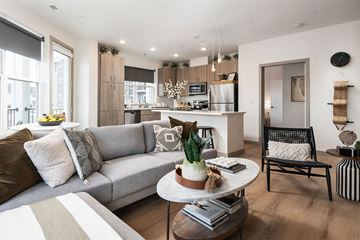 Cincinnati apartment for rent - a living room with a couch and a table