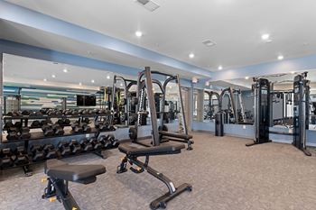 24-Hour fitness center with strength training & cardio equipment