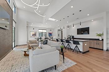 Community lounge with shuffleboard & kitchenette