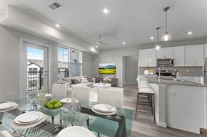 Mcmurray apartment for rent - A modern dining room with a glass table set for four.