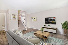 Schaumburg apartment for rent - a living room with a couch and a table