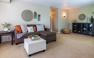 Kalamazoo apartment for rent - a living room with a couch and a coffee table