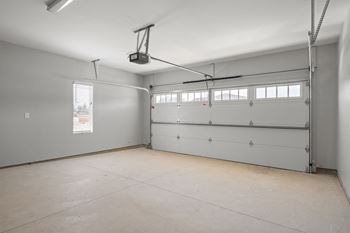 Attached two-car garage with two-car driveway (4 total spaces)