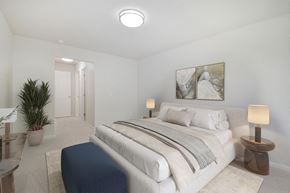 Shelby Township apartment for rent - a white bedroom with a bed and a white closet