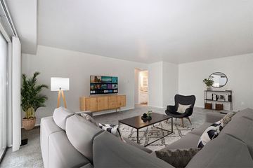 Saginaw apartment for rent - a living room with a couch and a chair