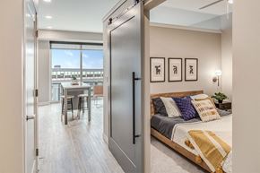Minneapolis apartment for rent - The Asher apartments bedroom with barn door