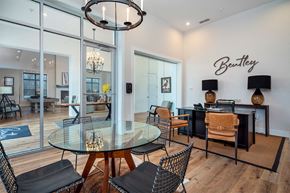 Grove City apartment for rent - a dining room with a glass table and chairs