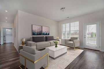 Grove City apartment for rent - a living room with a couch and a coffee table