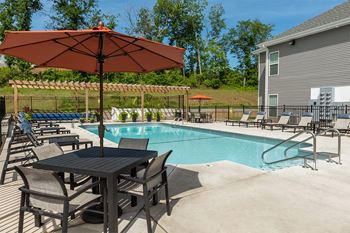 Outdoor swimming pool with sundeck