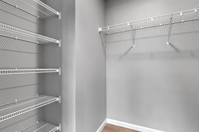 Ofallon apartment for rent - a spacious walk in closet in a home with empty shelves